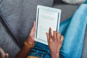 reading blog on tablet