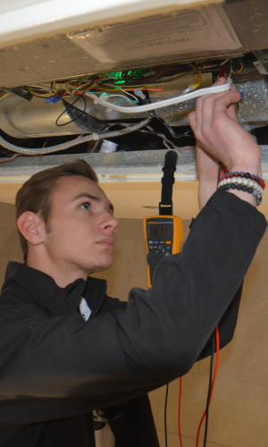 Tech Working on HVAC Unit